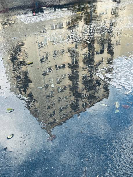 istock Puddle on the street 2185625466