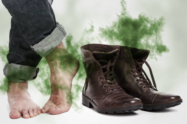 Stinky Feet and Leather Boots with Green Odor Cloud.