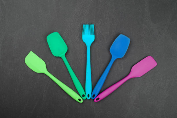 Burnt stovetop spatula of plastic burned by accident in the kitchen ,Common object used in the kitchen
