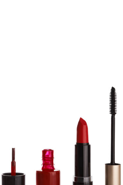 Nail Polish, Lipstick, and Mascara on White Background.