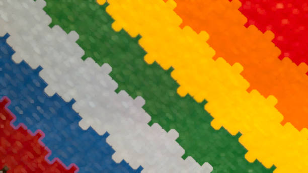 Vibrant rainbow background in puzzle toy, blurred multi-colored concept