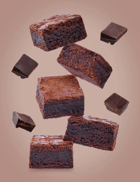 Dark chocolate brownie cakes on a brown background