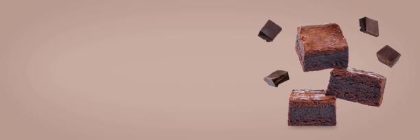 istock Dark chocolate brownie cakes on a brown background 2185634150