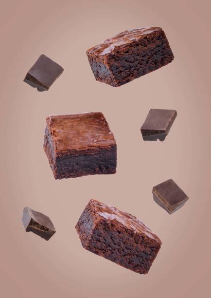 istock Dark chocolate brownie cakes on a brown background 2185634157