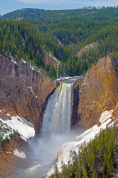 Upper Yellowstone Falls in Winter covered in heavy snow