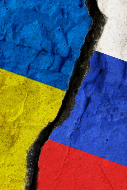 istock Ukrainian and Russian flags with a crack between them 2185638627