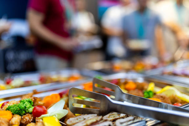 istock Delicious food displayed at a bustling outdoor buffet during a lively summer event 2185642296