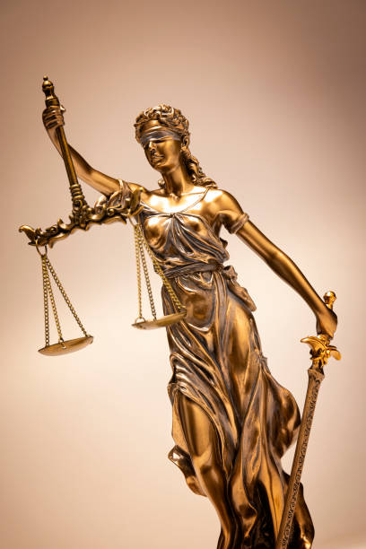 Lady Justice on a gold background