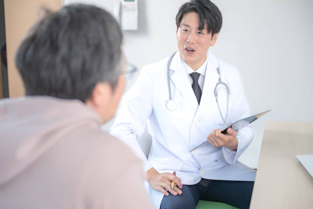 doctor and patient - 診察 ストックフォトと画像