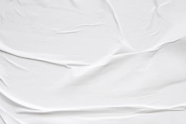 istock White blank crumpled and creased paper poster texture background 2185645343