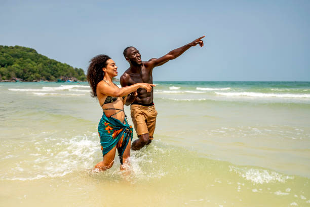 istock Joyful Couple Enjoying a Day at the Beach 2185646312