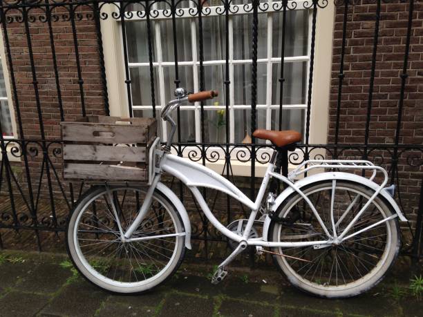 istock A white pedal bike with a crate. 2185647175