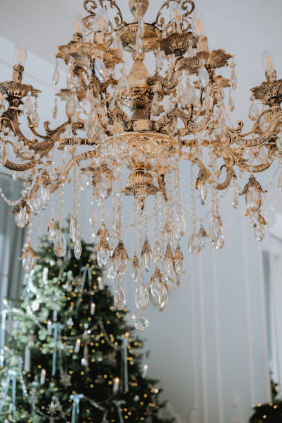 istock Crystal chandelier above a beautifully decorated Christmas tree 2185647635