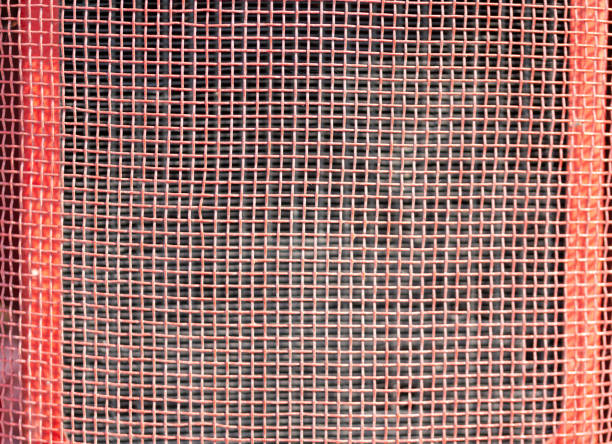 istock Close up of red net grill wallpaper or background 2185651145