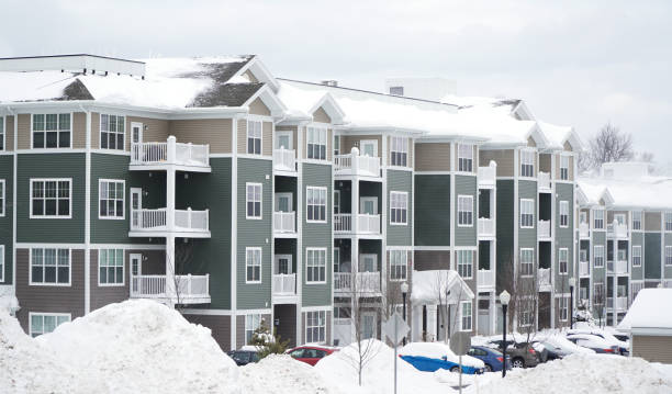 istock modern apartment building after winter snow storm 2185652853
