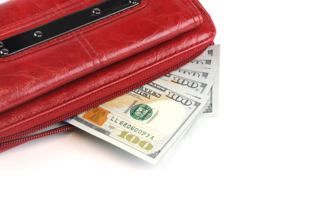 istock Red wallet with US dollar bills isolated on white background 2185652898