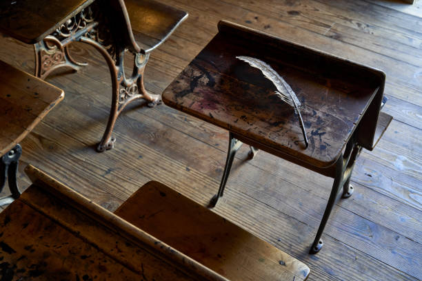 These antique desks still sit in rows waiting for the long gone students to return at the Lunenburg Academy in Nova Scotia,Canada