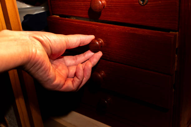 istock Opening a drawer in a dark room 2185665538