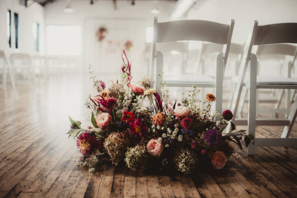 Bright and colorful wedding flowers decorating ceremony