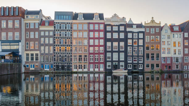 istock Charming autumn evening in Amsterdam along canals, featuring historic architecture and reflections 2185665716
