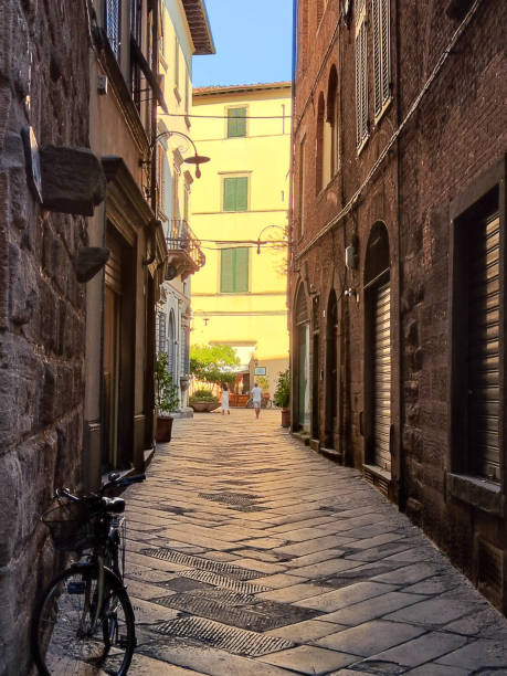 Alley in Lucca's historic centre, Tuscany, Italy.