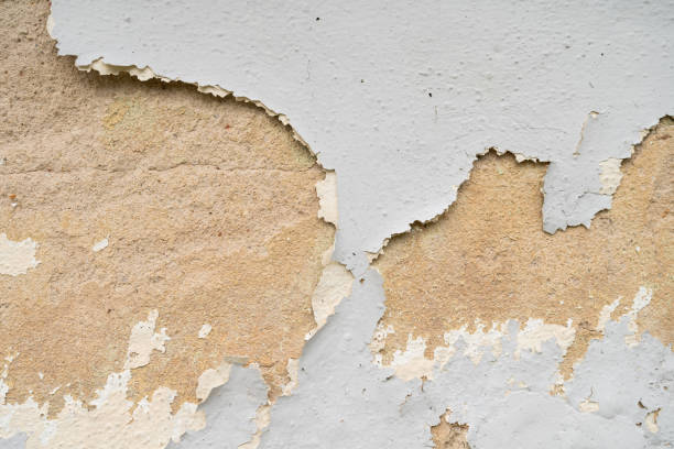 istock Close-up view of the wall paint peeling off. 2185670212