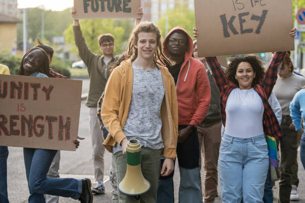 istock Diverse youth activists rally for unity and future: multicultural protest for social change 2185670346