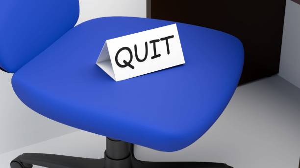 istock 3d rendering of office chair with a 'QUIT' sign. 2185672499