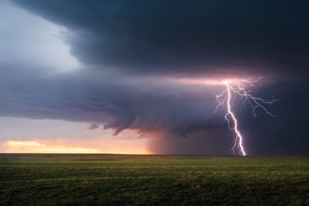 istock Stormy sky with lightning over a field during a severe weather event 2185673875
