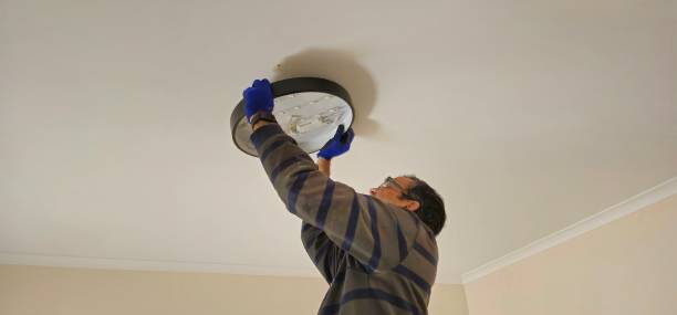 istock An Electrician is installing light.  Melbourne-Australia. 2185677119