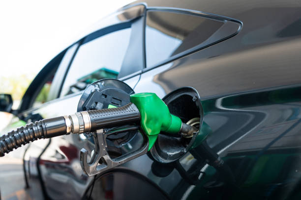 istock Refilling the car with fuel at the refuel station. 2185682942