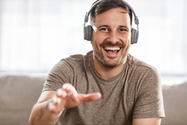 istock Young happy man having a video call at home. 2185687853
