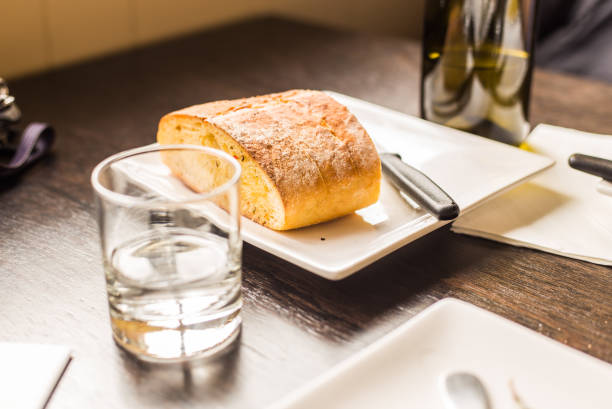loaf of bread on wooden background, food closeup