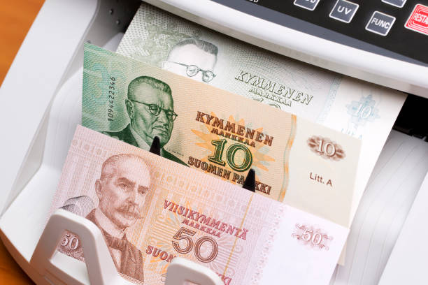 istock Old Finnish Marks in the counting machine 2185697505