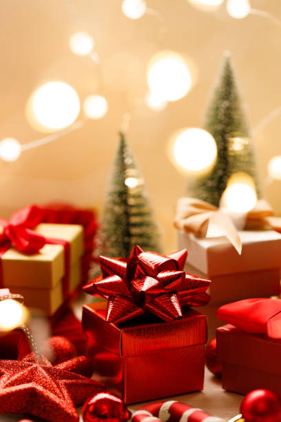 istock Red gift boxes on wooden background. Christmas New year concept. Selective focus. 2185697607