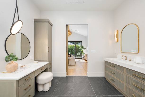 istock Modern bathroom with elegant vanity and round mirror 2185698739