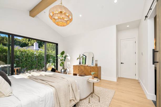 istock Modern bedroom with natural light and stylish decor. 2185699008