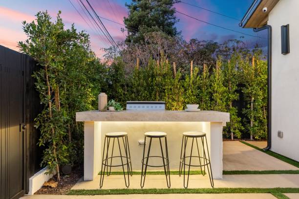 istock Modern outdoor bar setup at sunset. 2185699119