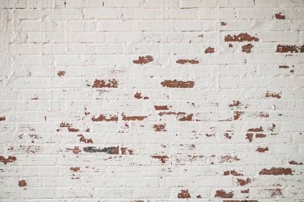 istock Industrial style brick wall with white paint 2185701225