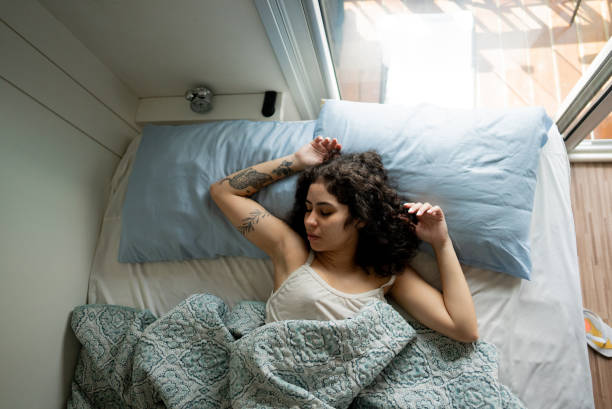 istock Young woman sleeping in the bedroom 2185701525