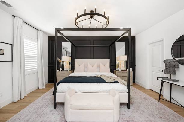 istock Modern bedroom with canopy bed and chandelier. 2185701802