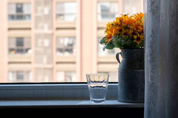glass of water beside window
