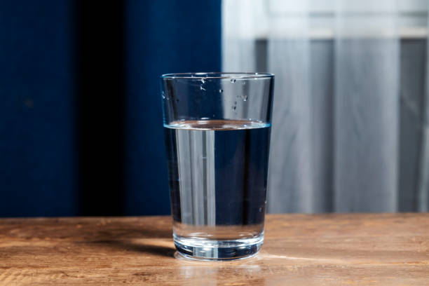 istock glass of water on table 2185705494