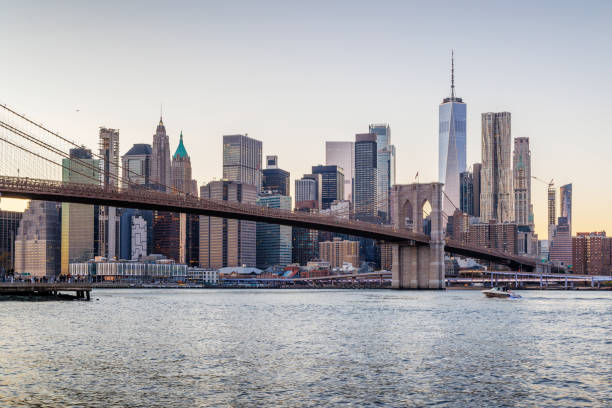 istock A panoramic sunset view of the Brooklyn Bridge stretching towards Manhattan 2185706089