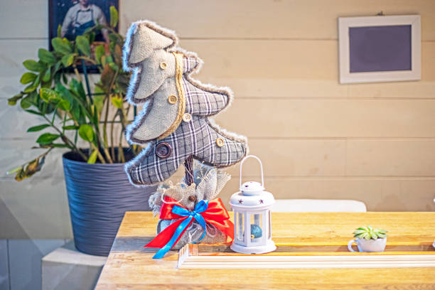 festive table setting with a Christmas tree and lanterns for Christmas and New Year. thanksgiving