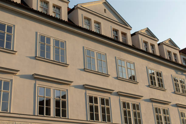 istock Facade of a historic building featuring windows set within an urban area 2185710168