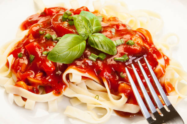 istock Pasta with tomato sauce and parmesan 2185710382