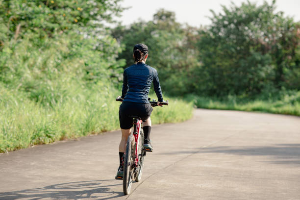 istock Riding bike in spring forest 2185712102