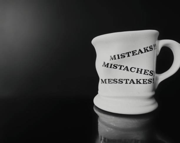 istock Coffee mug with the words.  MISTEAKS !!
Mistaches 
Messtakes 2185716577