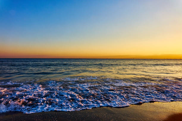 The sea beneath the setting sun